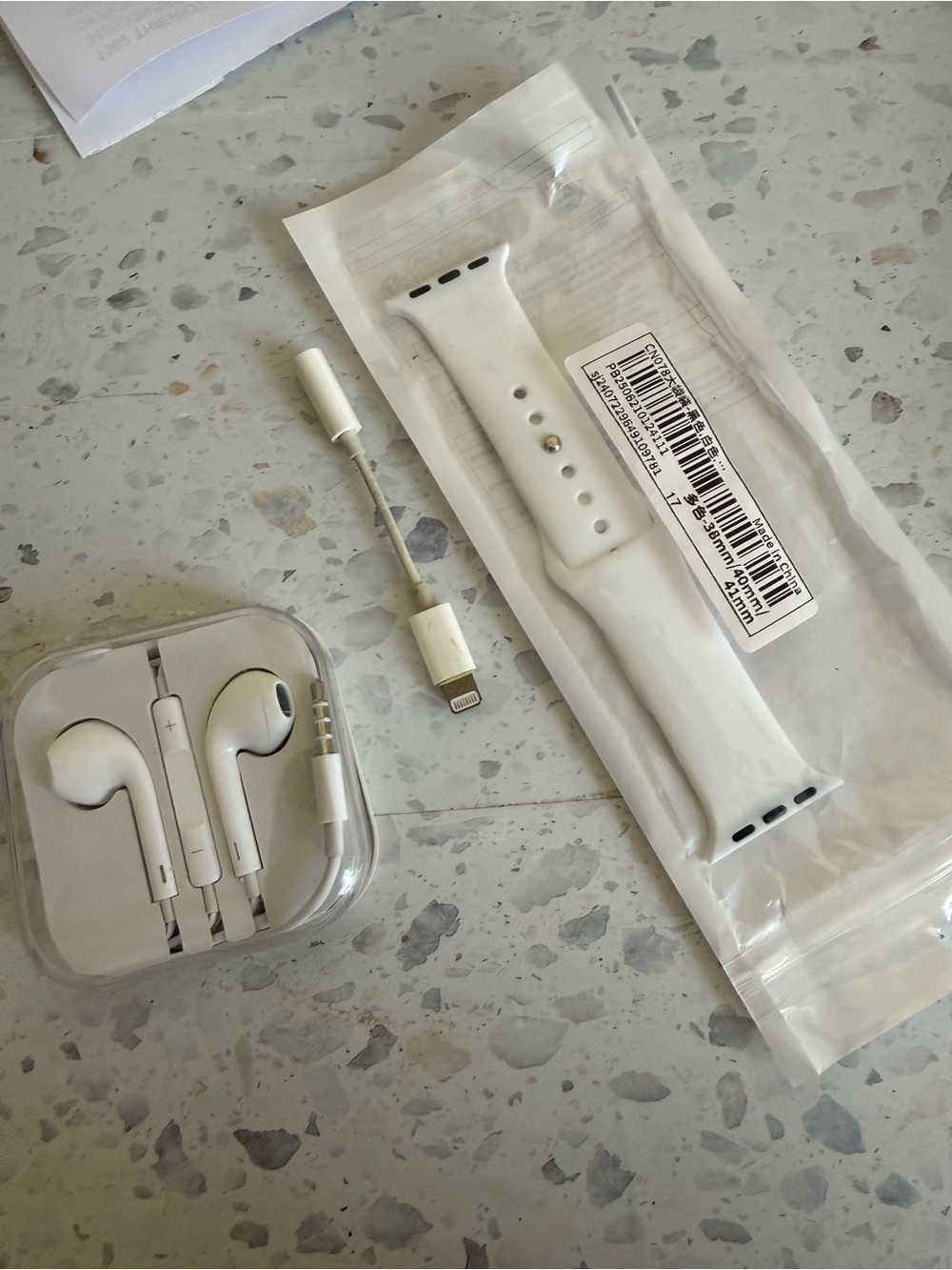 White Silicone Smartwatch Band with Lightning Earbuds and Adapter